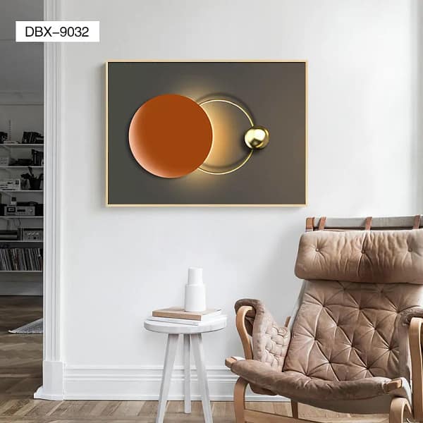 Minimalist Golden Wall Sconce with Orange Accent Wall Art