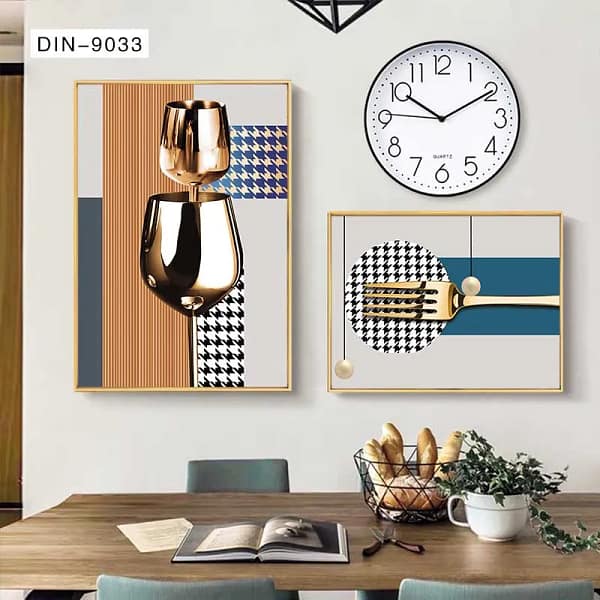 Stacked Golden Wine Glasses with Geometric Wall Art